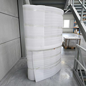 Curved housing wrapped in foam